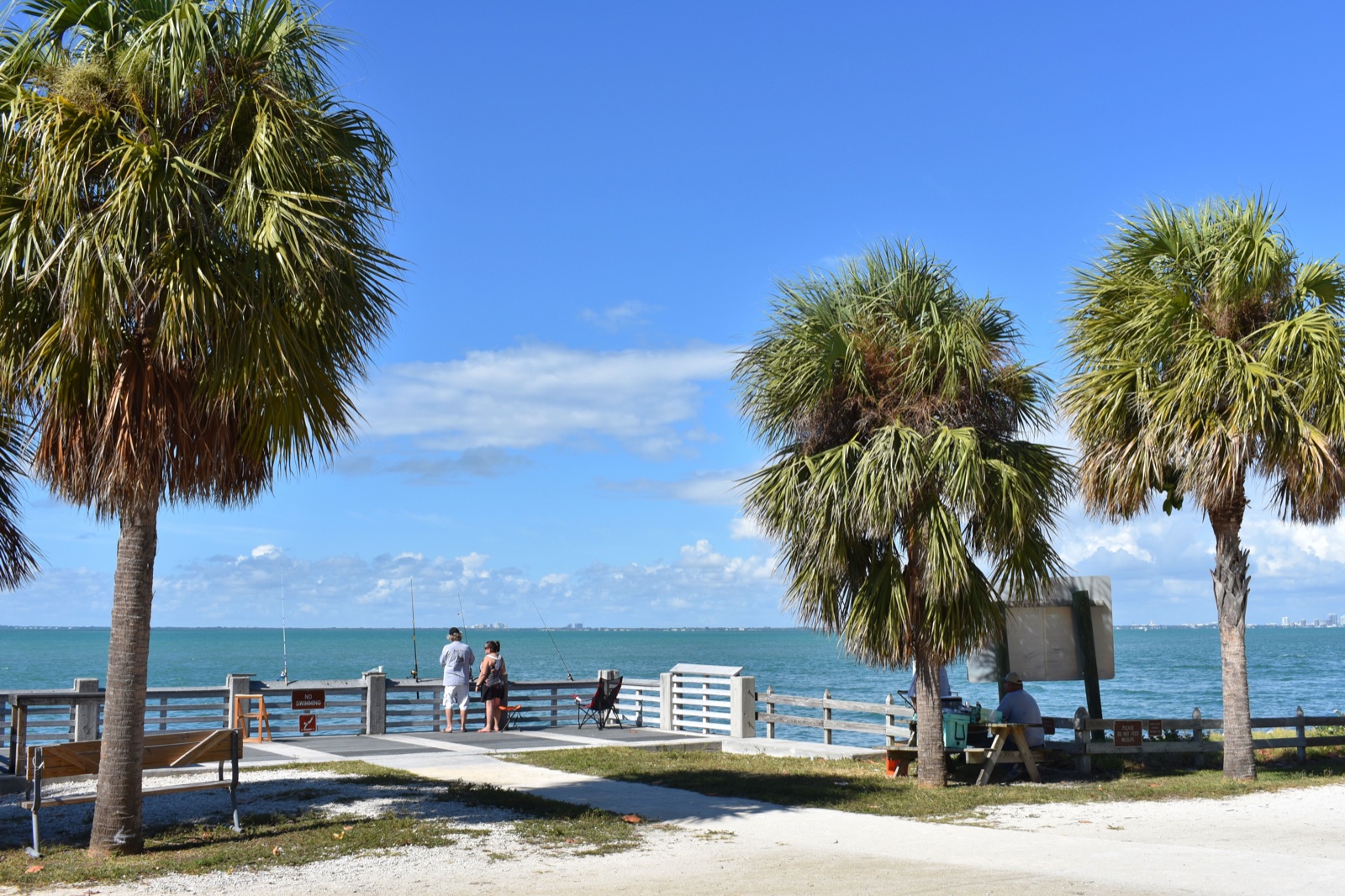 Palm-lined fishing pier at Bill Baggs Cape Florida State Park, Key Biscayne