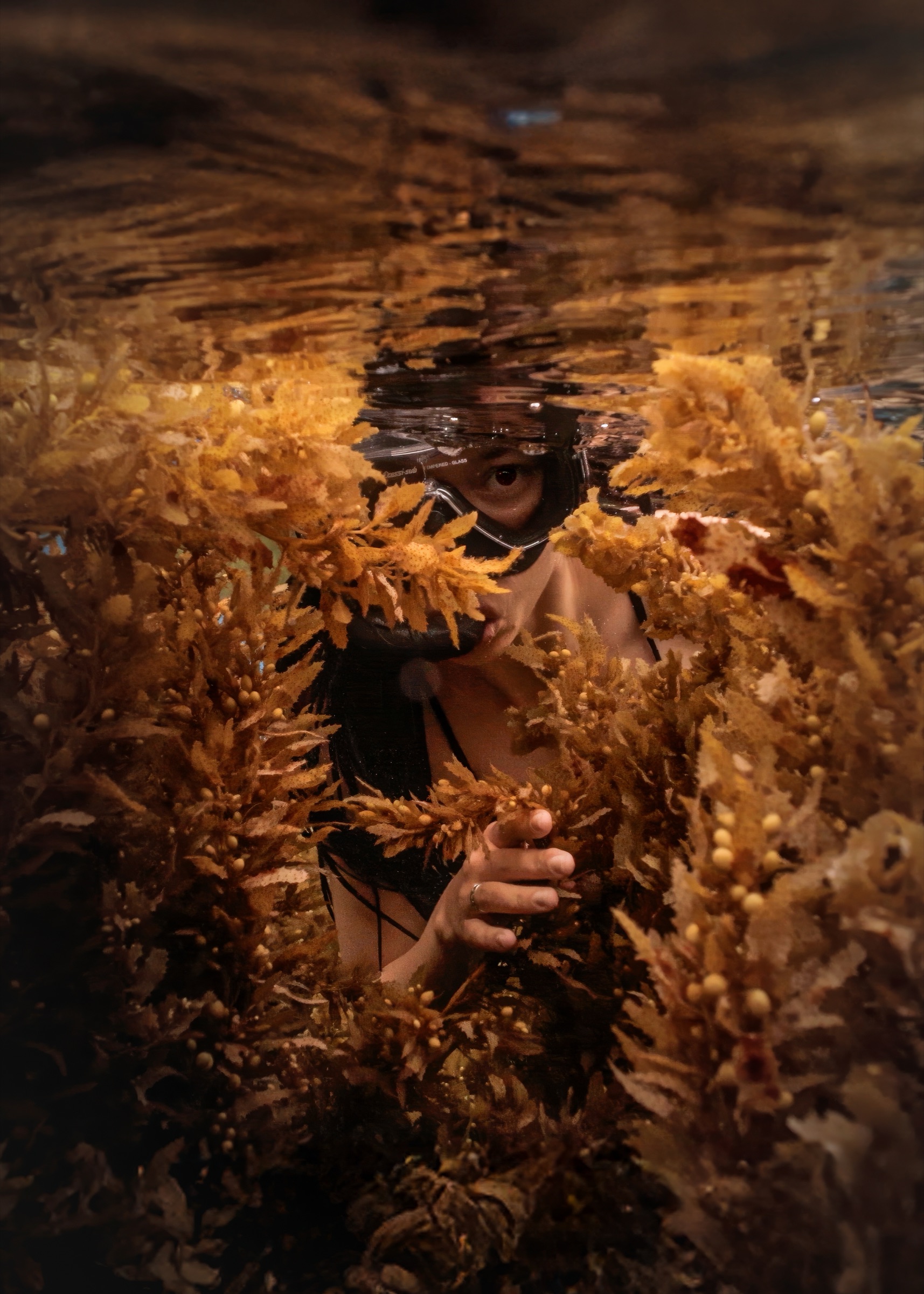 Female snorkeler underwater, portrait view