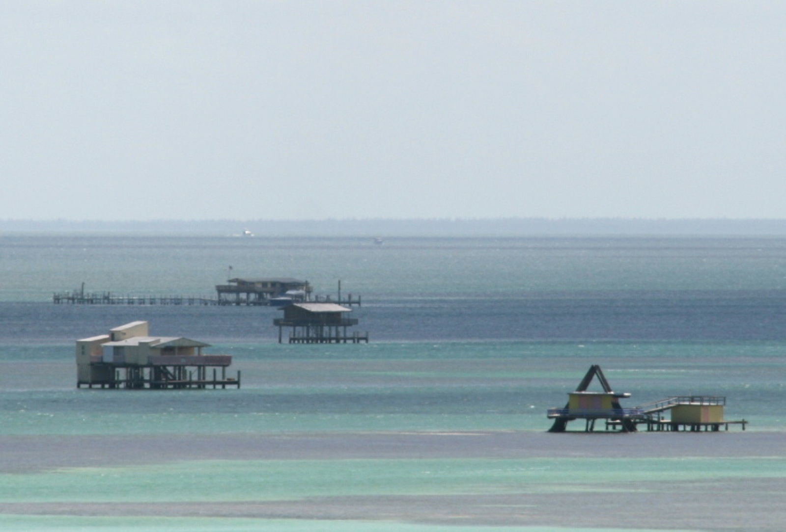 Wooden stilt houses standing in the shallow waters of Stiltsville, Biscayne Bay
