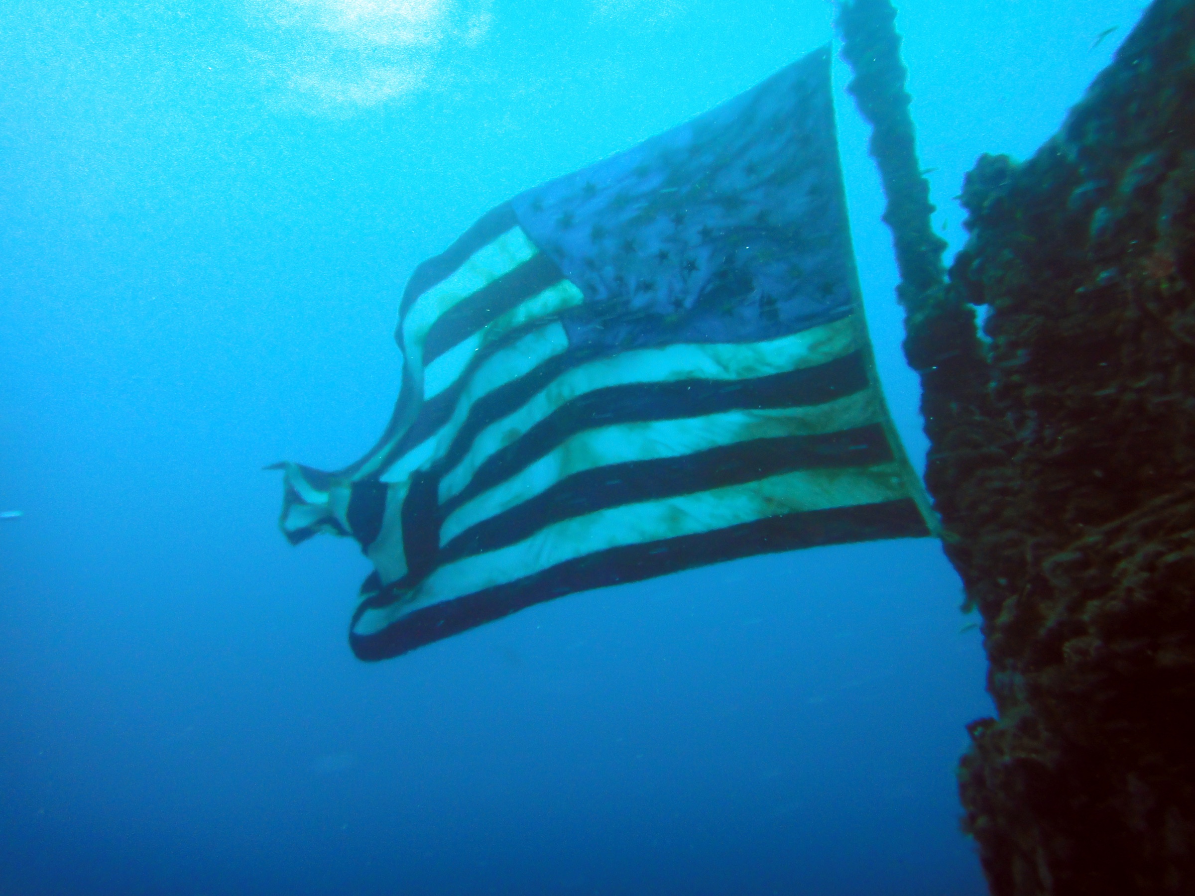 Scuba divers near the mast of the sunken USCGC Duane off Key Largo